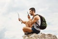 Young man tourist with a backpack