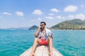 Young Man Tourist Sail Long Tail Thailand Boat Speak Cell Smart Phone Call Ocean Sea Vacation Travel Trip Royalty Free Stock Photo
