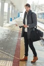 Young man at train station Royalty Free Stock Photo