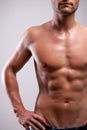 Young man trained topless with abs