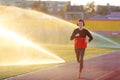 Young man is training at a sports stadium Royalty Free Stock Photo