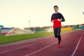 Young man is training at a sports stadium Royalty Free Stock Photo