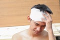 Young man with trauma of the head. by Medical bandage Royalty Free Stock Photo