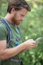 young man traveler he using mobile phone travel concept Royalty Free Stock Photo
