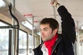 Young man traveling alone by public transport Royalty Free Stock Photo