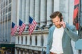 Young Man traveling in New York City, talking on cell phone Royalty Free Stock Photo