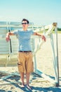 Young Man traveling, relaxing on the beach in New Jersey, USA Royalty Free Stock Photo