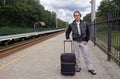 Young man travelling by train