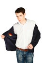 Young man tries on jacket isolated on white background Royalty Free Stock Photo
