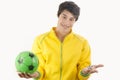 Young man with two football balls. Royalty Free Stock Photo