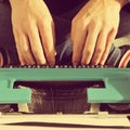 Young man typewriting, with a retro effect Royalty Free Stock Photo