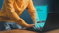 Young man typing his user and password on a computer laptop. Cyber security concept to protect personal data. Royalty Free Stock Photo