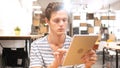 Young Man Using Applications on Tablet Computer, Portrait Royalty Free Stock Photo