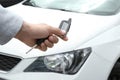 Young man using car alarm system Royalty Free Stock Photo