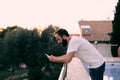 Young man using a chat app in his forest house Royalty Free Stock Photo