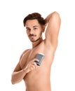 Young man using deodorant Royalty Free Stock Photo