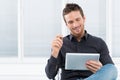 Young Man Using Digital Tablet Royalty Free Stock Photo