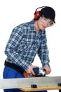 Young man using hacksaw Royalty Free Stock Photo