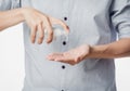 Young man using hand sanitizer or alcohol gel for washing hands, Corana virus or Covid-19 prevention, Hygiene concept. Royalty Free Stock Photo