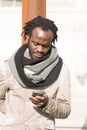 Young man using his phone Royalty Free Stock Photo