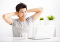 young man using laptop in living room Royalty Free Stock Photo