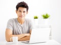 young man using laptop in living room Royalty Free Stock Photo