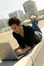 Young man using laptop outdoor Royalty Free Stock Photo