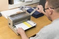 Using a paper binding machine