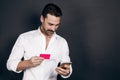 Young man using mobile payment Royalty Free Stock Photo