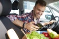 Young Man Using Smartphone in Car Royalty Free Stock Photo