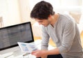 Young man using a tablet at the office