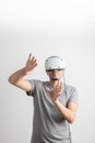 Young man using VR headset. Guy playing with VR glasses Royalty Free Stock Photo