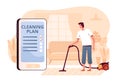 A young man vacuums a carpet at home in the living room. The concept of a mobile application for cleaning planning