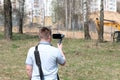 A young man videotaping on a smartphone. Royalty Free Stock Photo