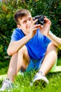 Young Man with a Camera Royalty Free Stock Photo