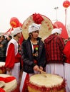 Young man wait to play drum in the snow