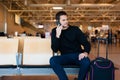 Young man waiting in international airport Royalty Free Stock Photo