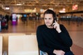 Young man waiting in international airport Royalty Free Stock Photo