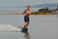 Young Man Wakeboarding in Casco Bay on a Summer Day Royalty Free Stock Photo