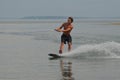 Young Man Wakeboarding on a Summer Day in Maine Royalty Free Stock Photo