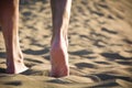 Young man walking down a dune Royalty Free Stock Photo