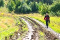 Young man walking on the road Royalty Free Stock Photo