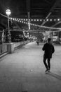 A young man walking towards Southbank centre in central London