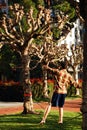 Slack line walking on campus Royalty Free Stock Photo