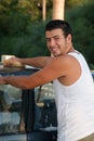 Young man washing the car