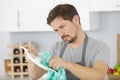 Young man washing dishes Royalty Free Stock Photo