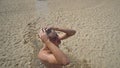 Man washing hair under shower on beach Royalty Free Stock Photo