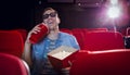 Young man watching a 3d film Royalty Free Stock Photo