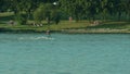 Young man waterskiing on the lake