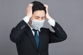 Young man wear medical mask and  headache  concepts Royalty Free Stock Photo